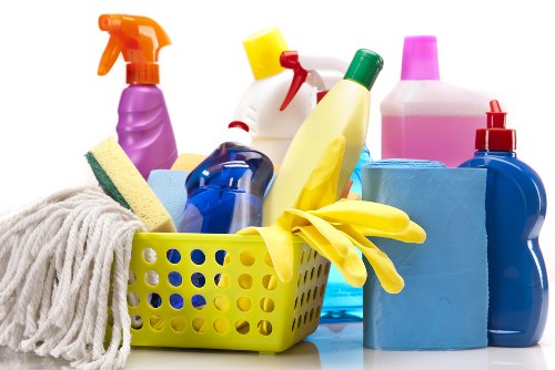 Carpet care service in progress with cleaning tools and treated flooring