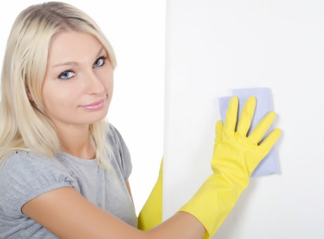 Local cleaners working in a Barnes flat with careful access planning